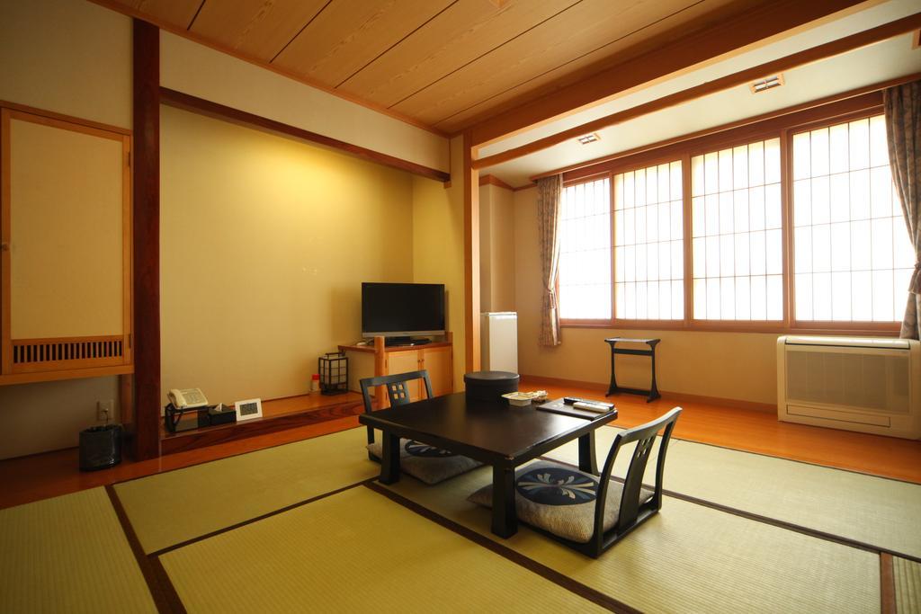 Okaerinasai Hotel Iwanai Kamer foto